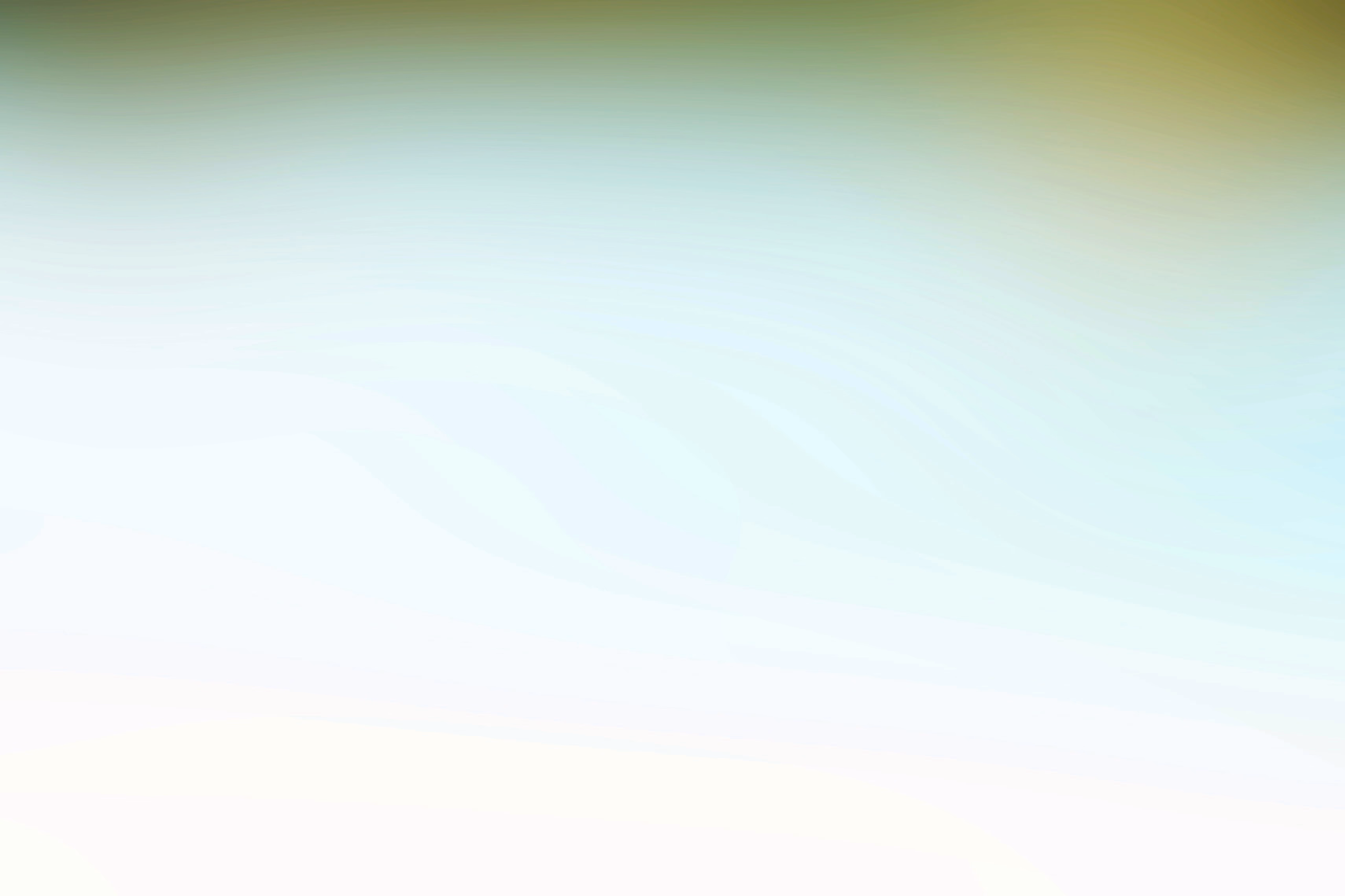 a blurry image of a green and yellow background